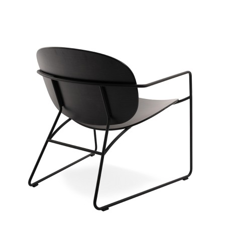 Vue arrière du fauteuil Tondina Lounge bois noir, design minimaliste