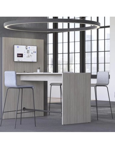 Tabourets Moon installés dans un espace de coworking avec mange-debout en bois clair