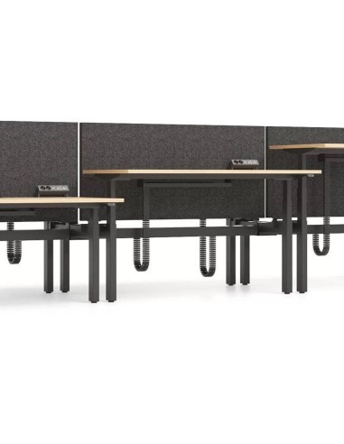 Bureau bench réglable électriquement avec écrans de séparation acoustiques et gestion des câbles.