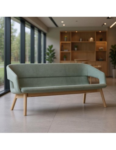 canapé design TWIST&SIT Soft vert clair avec piètement bois pour espace lounge professionnel lumineux