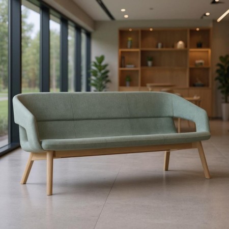 canapé design TWIST&SIT Soft vert clair avec piètement bois pour espace lounge professionnel lumineux