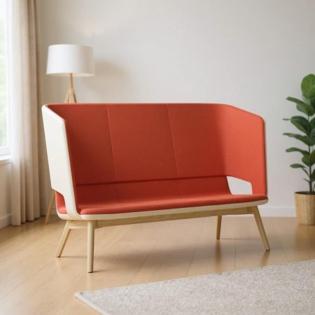 Canapé lounge dossier cocon de tissu orange et blancs dans un salon lounge – TWIST&SIT Soft