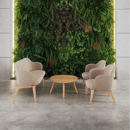 Deux fauteuils Flos Lounge devant un mur végétalisé – Flos Lounge