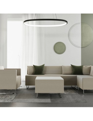 Salon moderne composé de modules tapissés beiges et verts en configuration ouverte. - Quadra