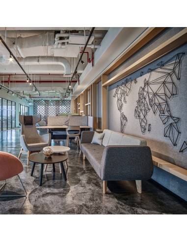 Zone lounge accueillante avec mobilier coloré et ambiance détendue. - U Floe