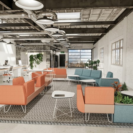 Espace ouvert avec banquettes orange et ambiance industrielle. - U Floe
