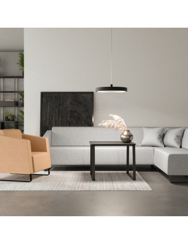 Canapé vert vif dans espace détente design. - Voo Voo