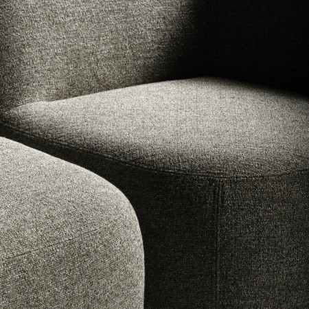 Détail d’un fauteuil rouge sous lumière tamisée. - Jelly