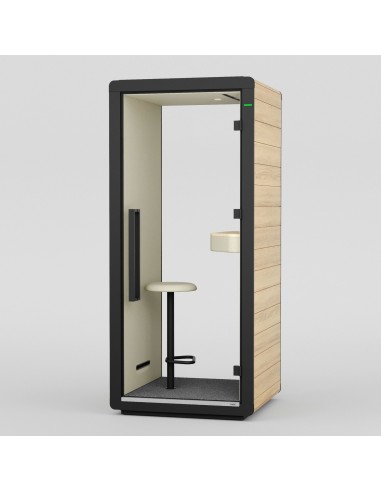 Cabine Flathouse pour une personne, équipée d’un siège et d’une tablette. - Flathouse