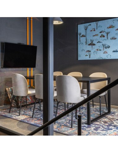 Chaise pour environnement pro et salle de réunion avec assise confortable et design minimaliste Flos