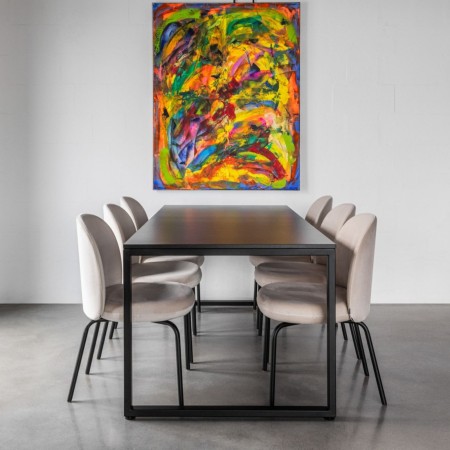 confort premium de l'assise de la chaise Flos 215 en salle de réunion