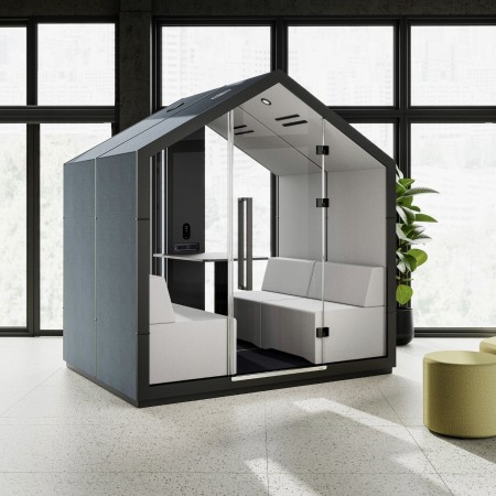 Cabine Treehouse isolée dans un bureau moderne, finition grise et banquette intégrée. - Treehouse