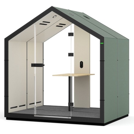 Cabine Treehouse deux places avec assises beiges et table intégrée. - Treehouse