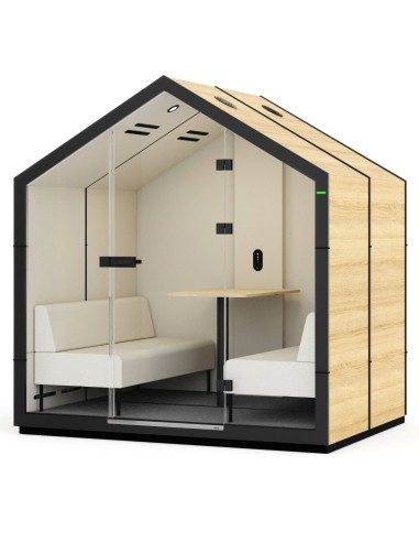 Cabine Treehouse en bois et structure noire, intégrée dans un hall lumineux avec plantes. - Treehouse